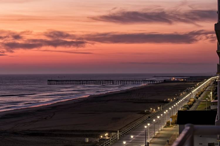 Virginia beach boardwalk at dawn.