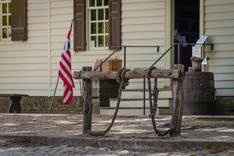 american flag outside a building in colonial williamsburg