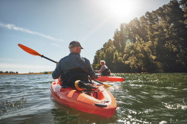 people kayaking in nature