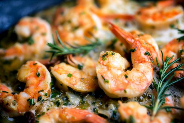 buttered shrimp in a skillet