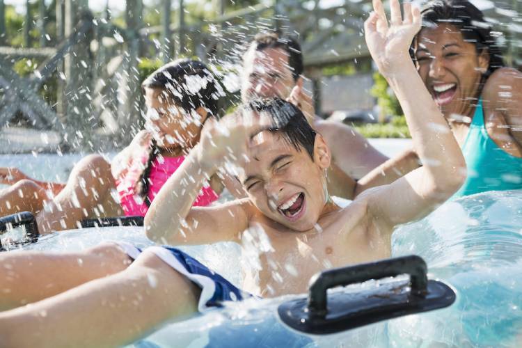 family enjoying the water at water country