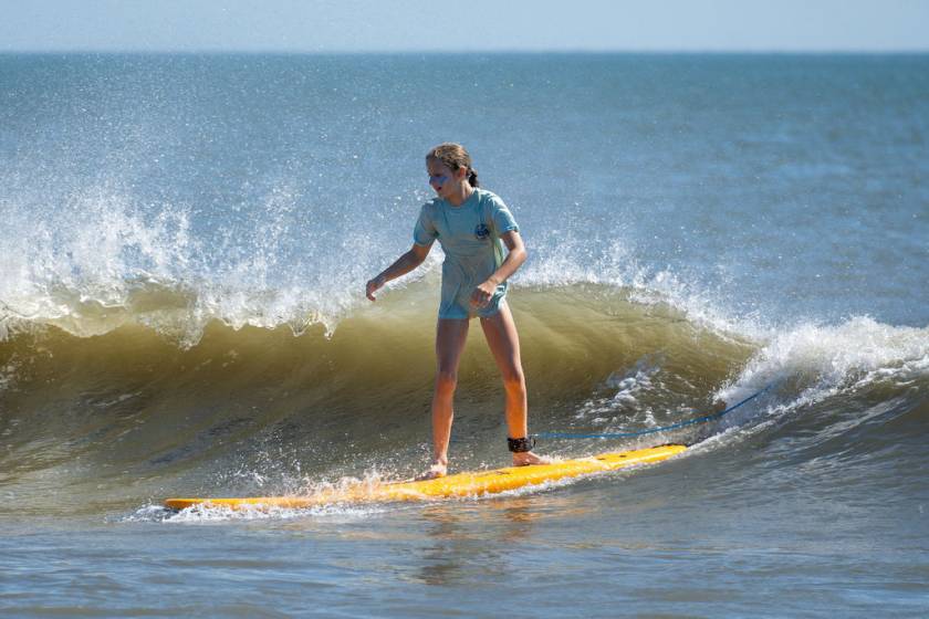 Surfing at Sandbridge Beach, VA.